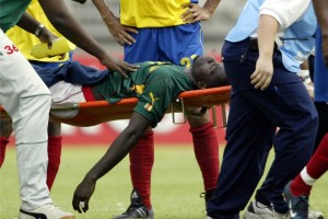 professional soccer player being carried off the field after a heart attack