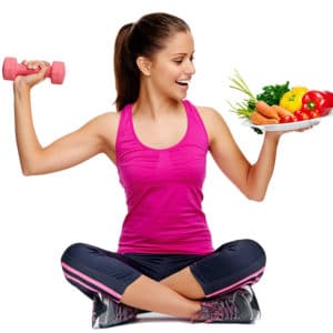 woman holding a weight in one hand and vegetables in the other